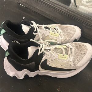 Nike Giannis Immortality 2 basketball shoes in the white, black, and volt